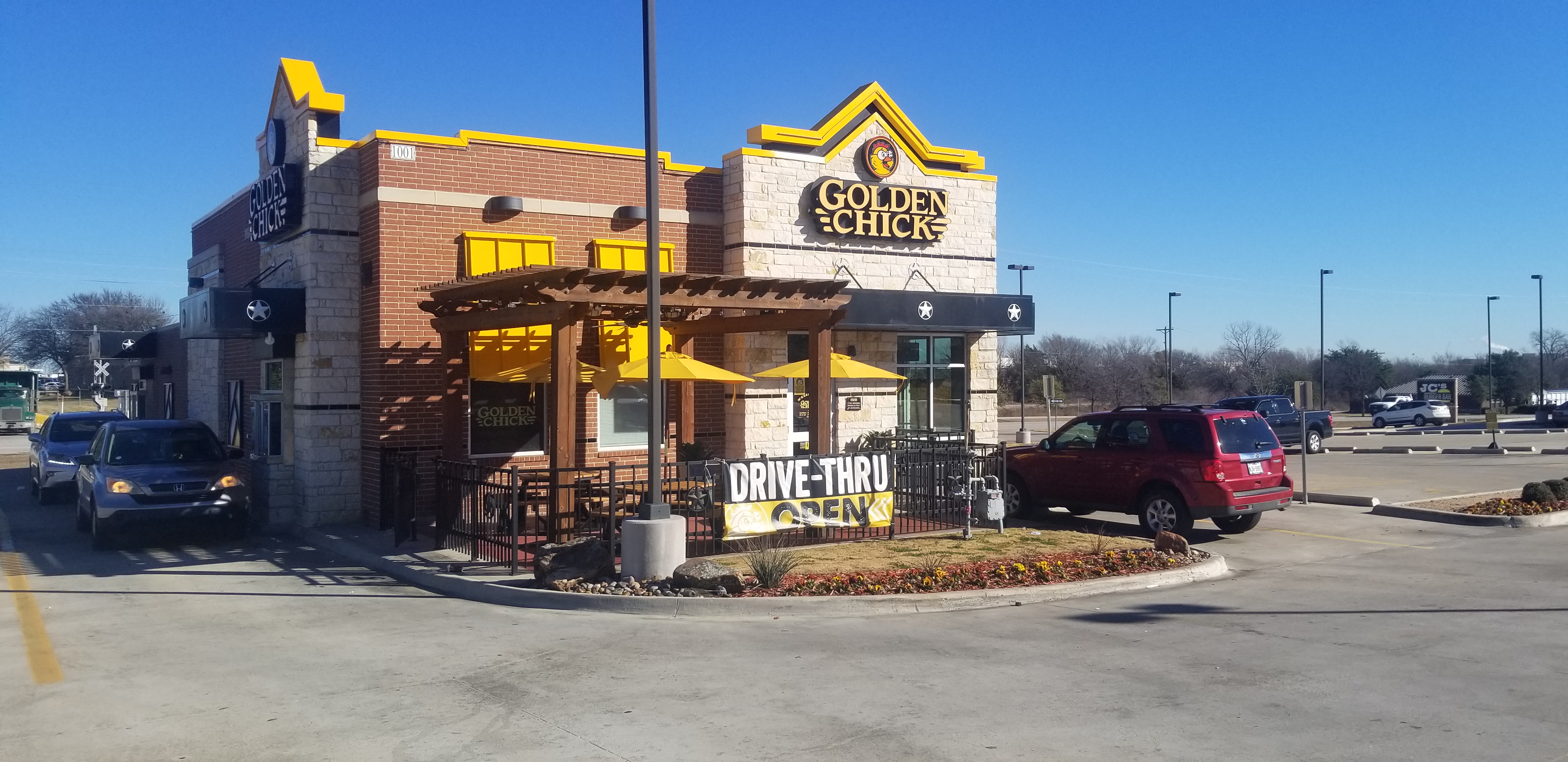 Golden Chick storefront.  Your local Golden Chick fast food restaurant in Mesquite, Texas