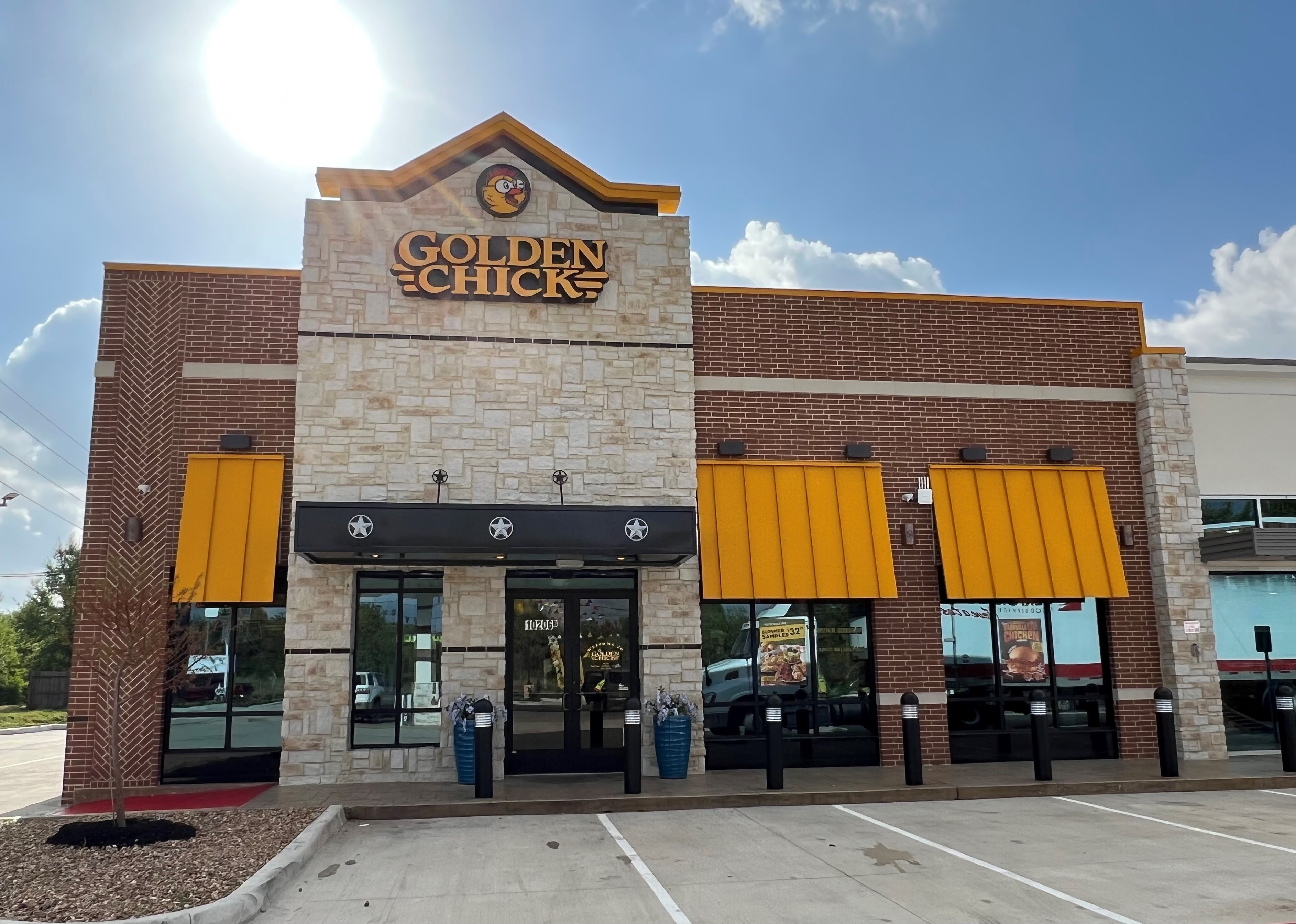 Golden Chick storefront.  Your local Golden Chick fast food restaurant in Houston, Texas