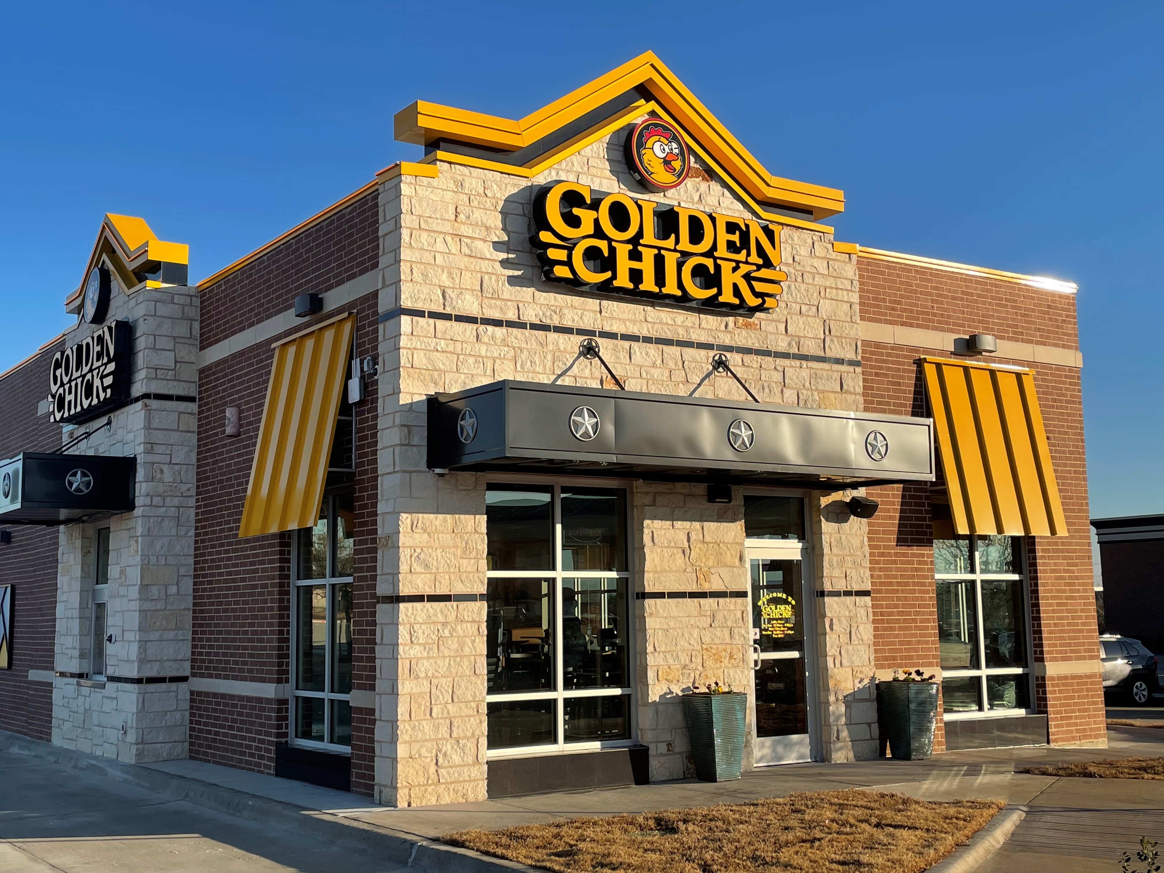 Golden Chick storefront.  Your local Golden Chick fast food restaurant in Allen, Texas