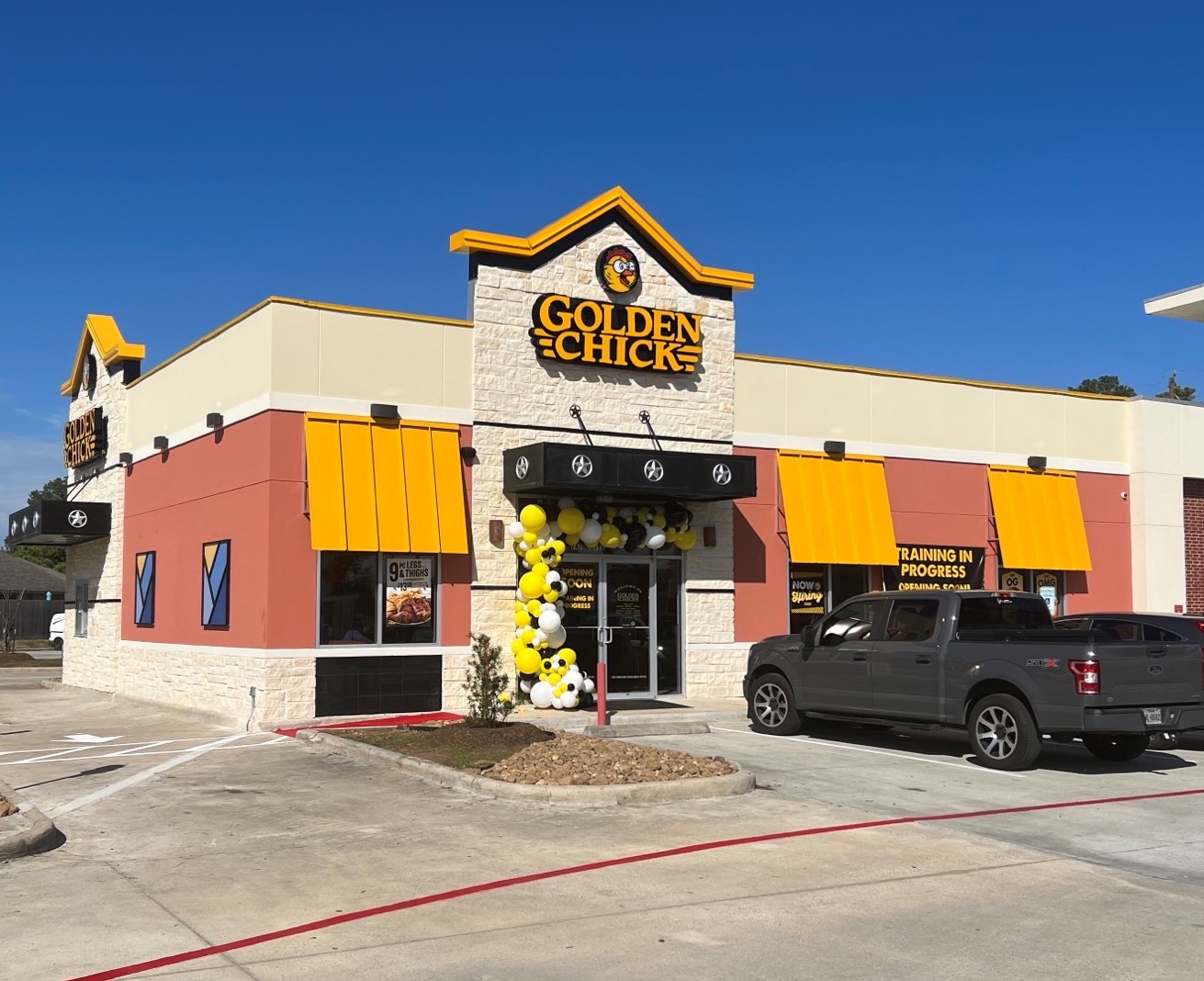 Golden Chick storefront.  Your local Golden Chick fast food restaurant in Spring, Texas
