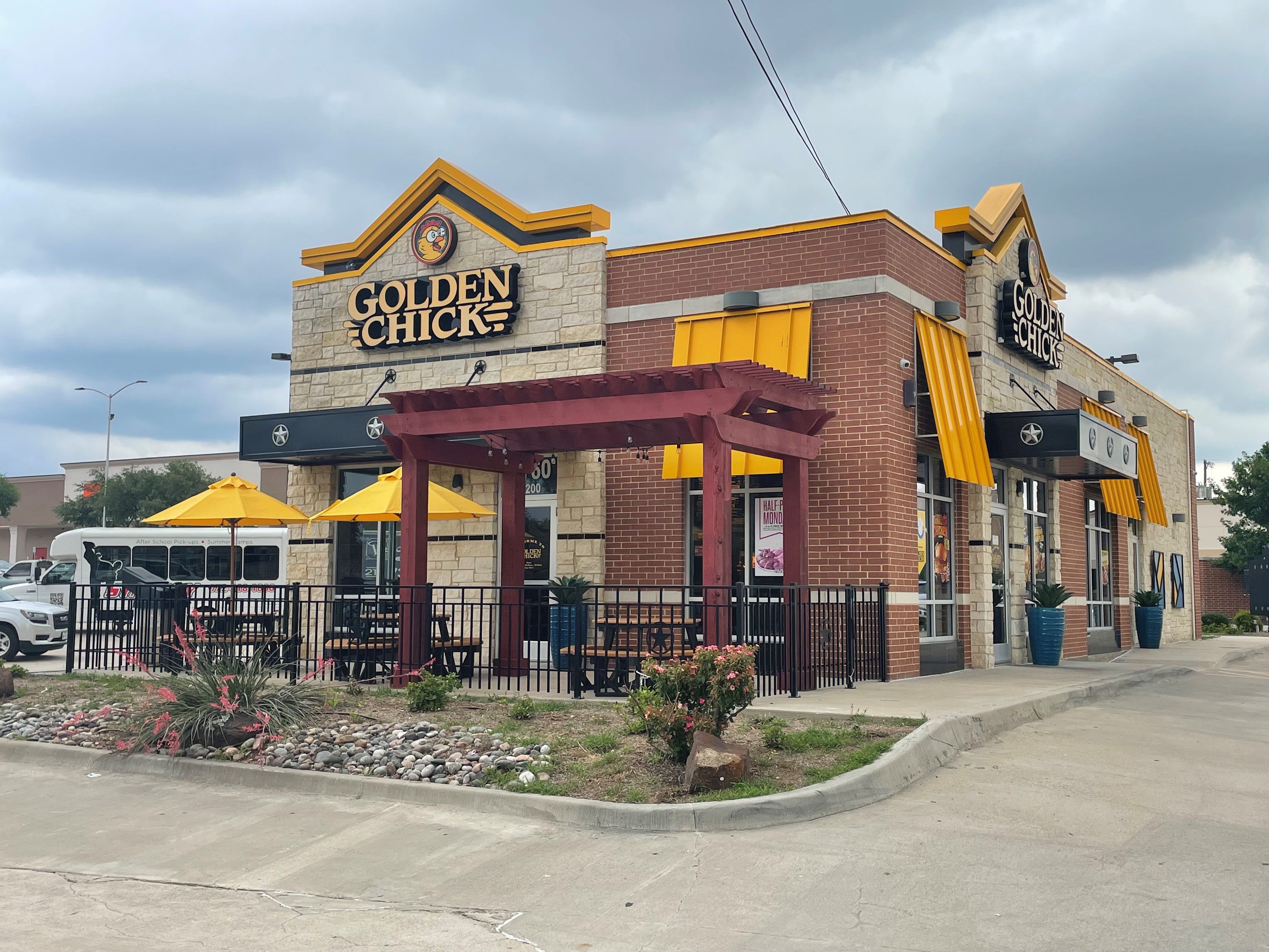 Golden Chick storefront.  Your local Golden Chick fast food restaurant in Carrollton, Texas