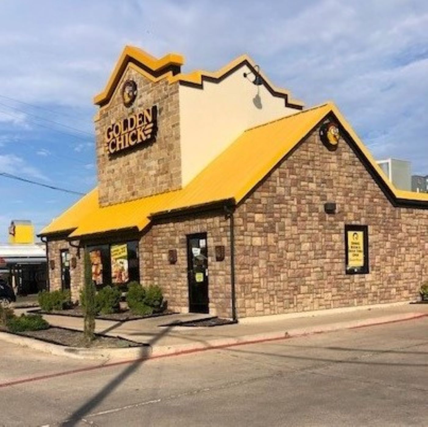 Golden Chick storefront.  Your local Golden Chick fast food restaurant in Stephenville, Texas
