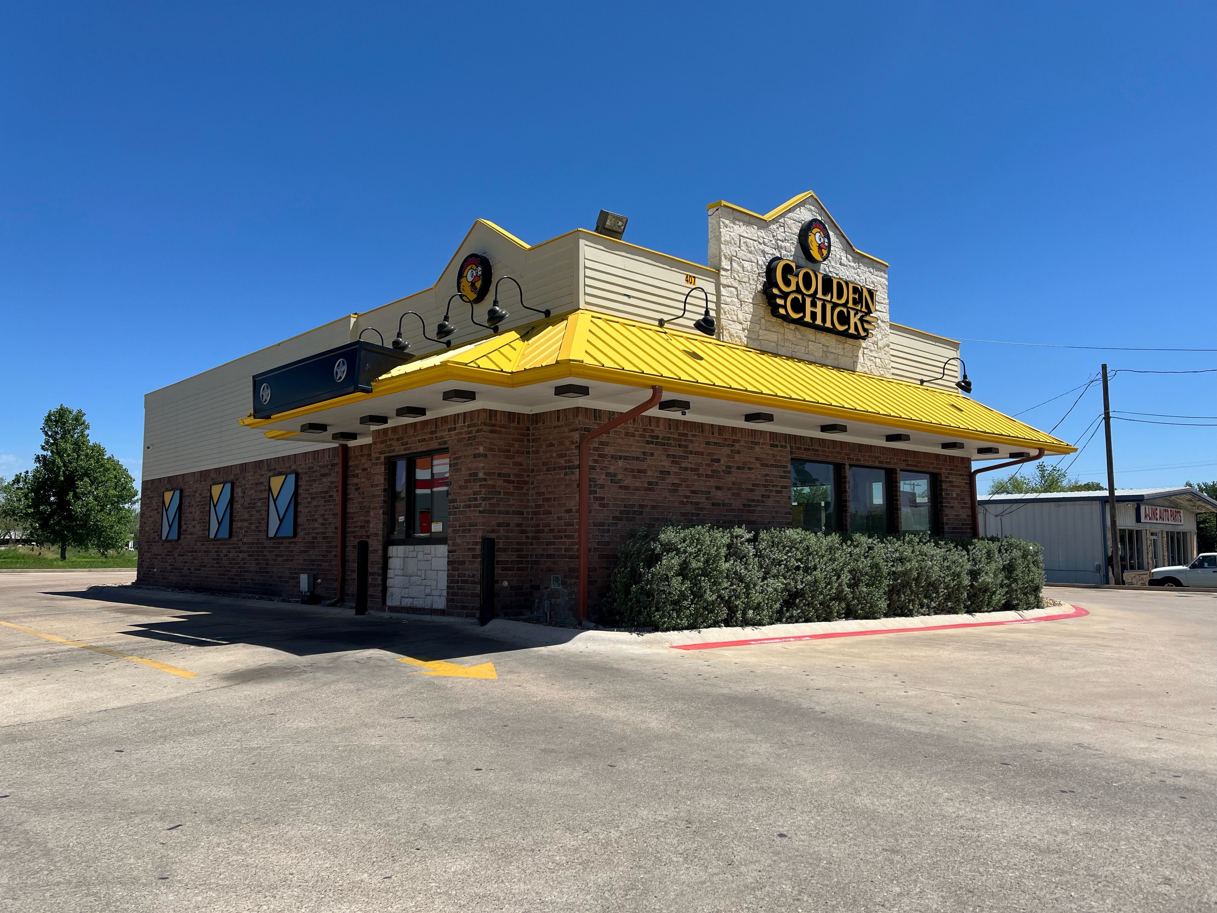 Golden Chick storefront.  Your local Golden Chick fast food restaurant in Elgin, Texas