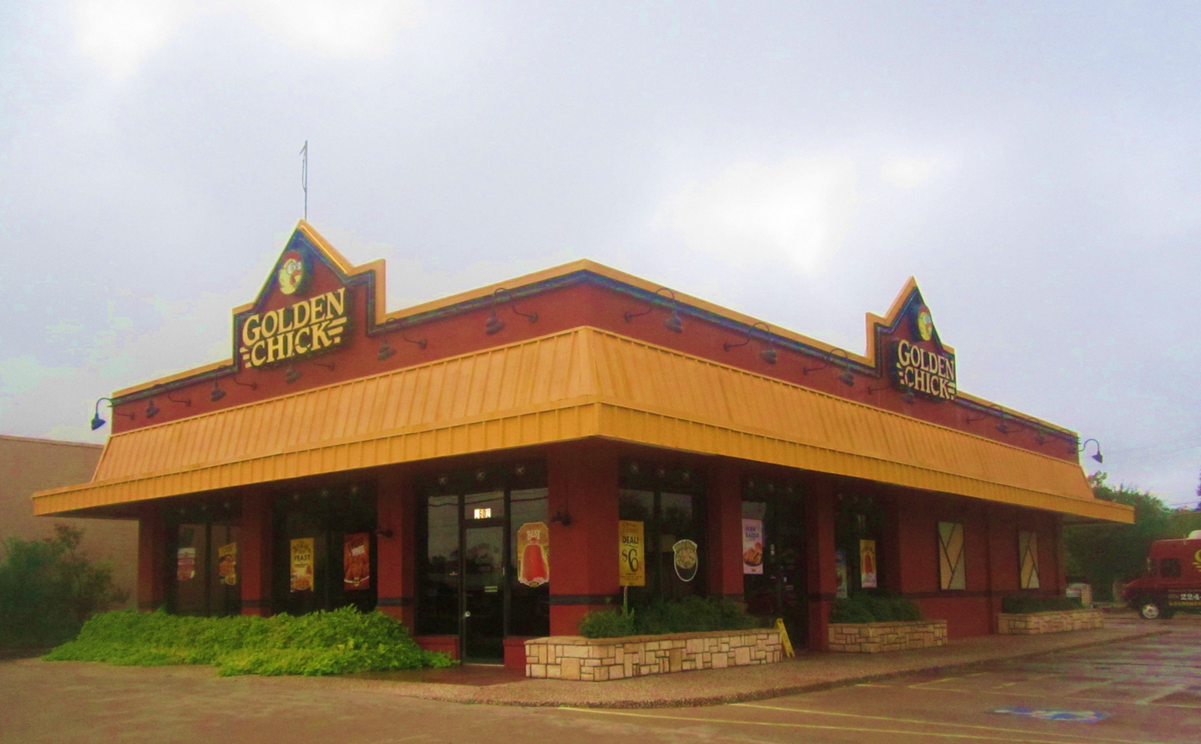 Golden Chick storefront.  Your local Golden Chick fast food restaurant in San Angelo, Texas