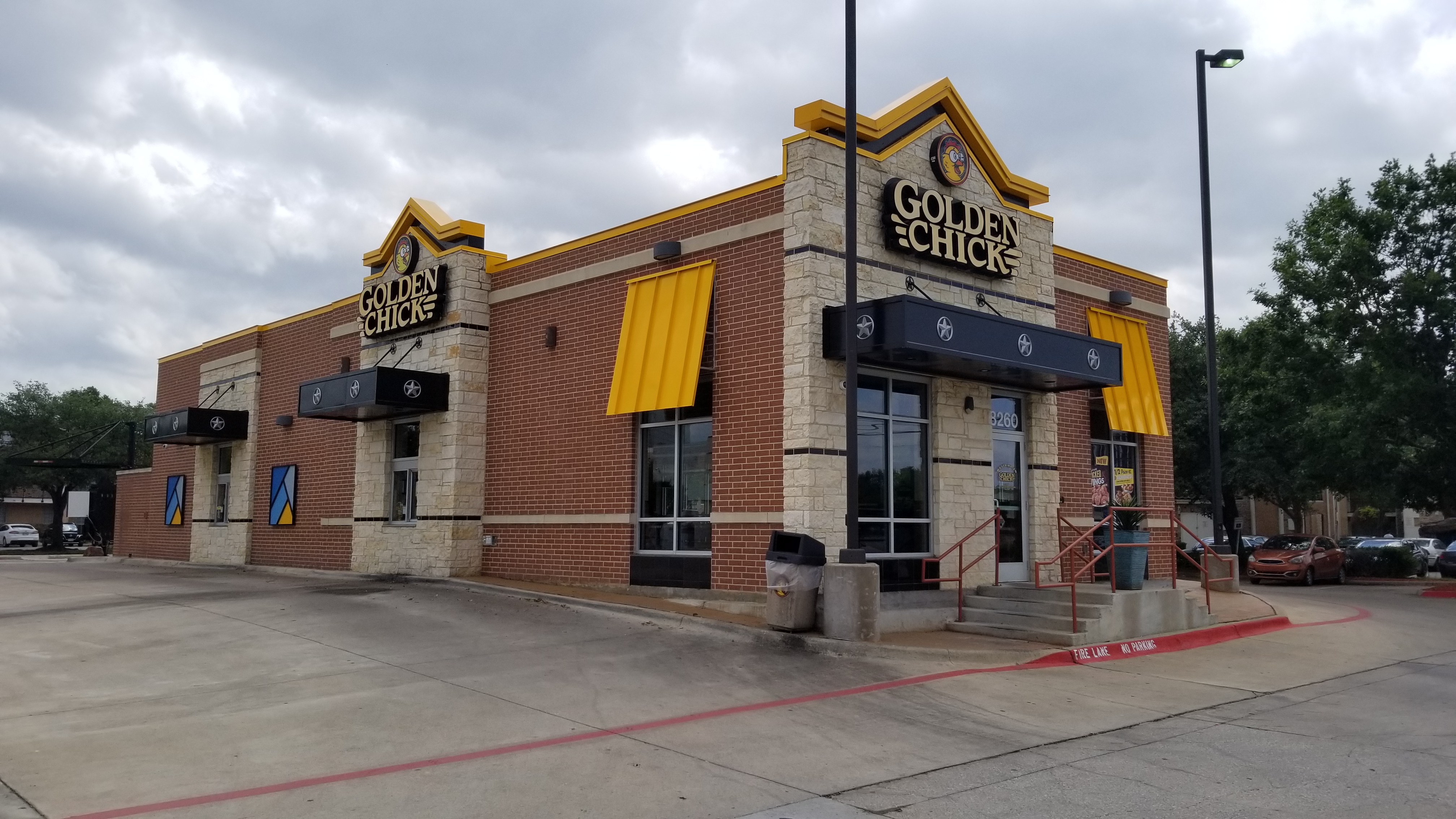 Golden Chick storefront.  Your local Golden Chick fast food restaurant in Dallas, Texas