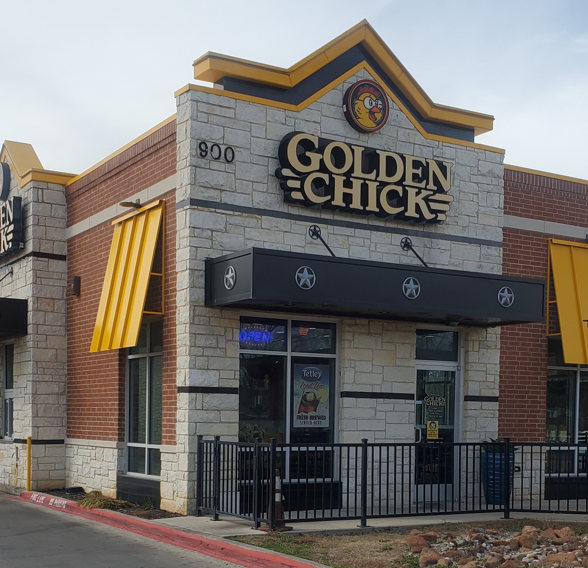 Golden Chick storefront.  Your local Golden Chick fast food restaurant in Grand Prairie, Texas