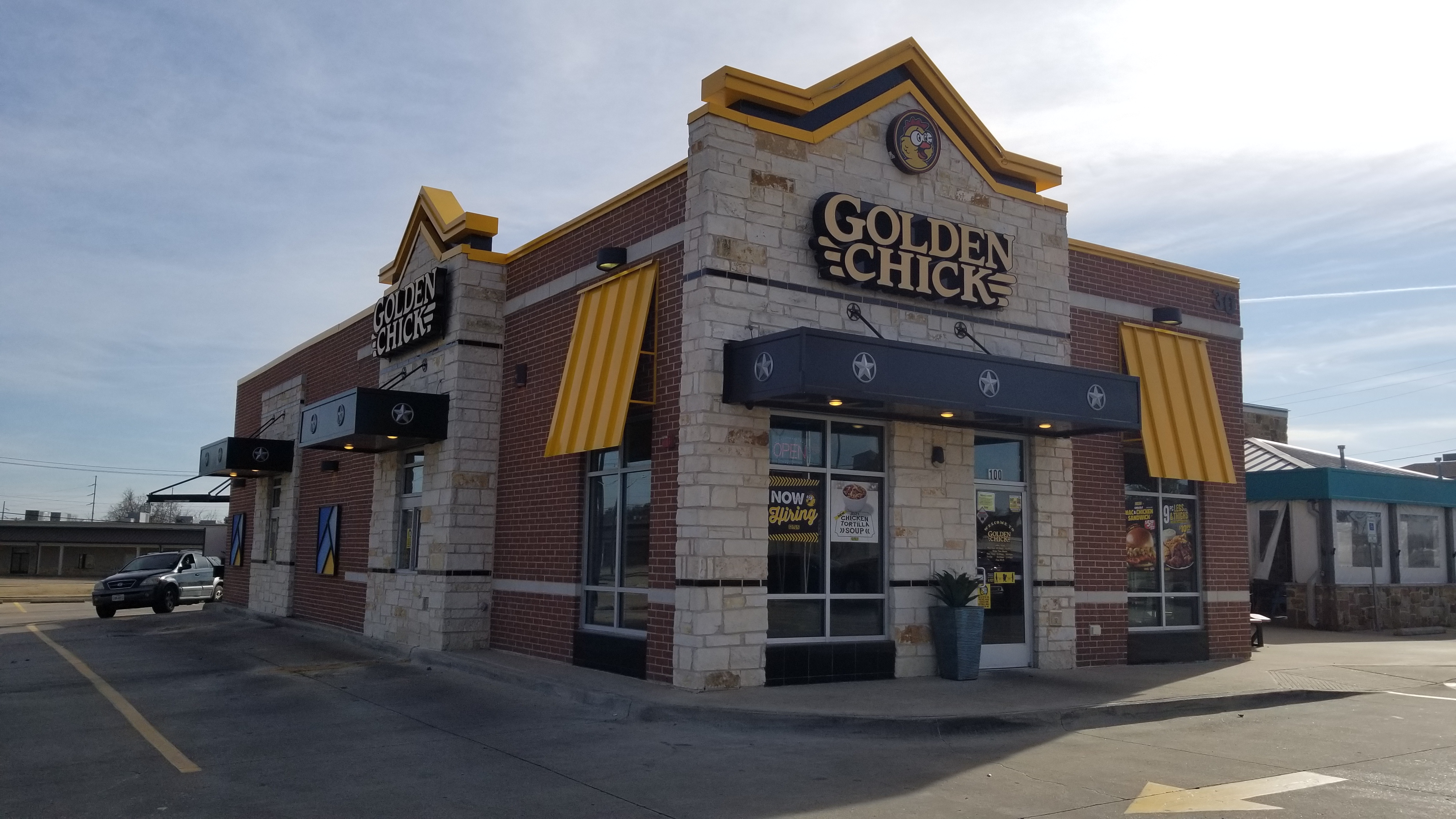 Golden Chick storefront.  Your local Golden Chick fast food restaurant in Garland, Texas