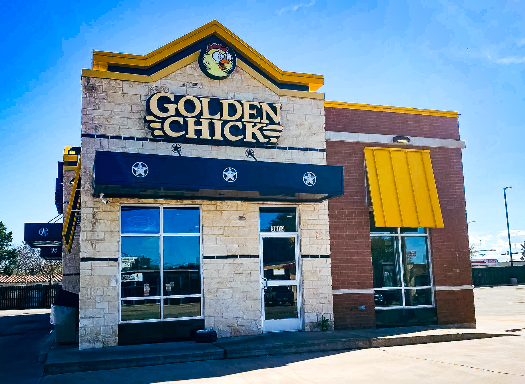 Golden Chick storefront.  Your local Golden Chick fast food restaurant in Abilene, Texas