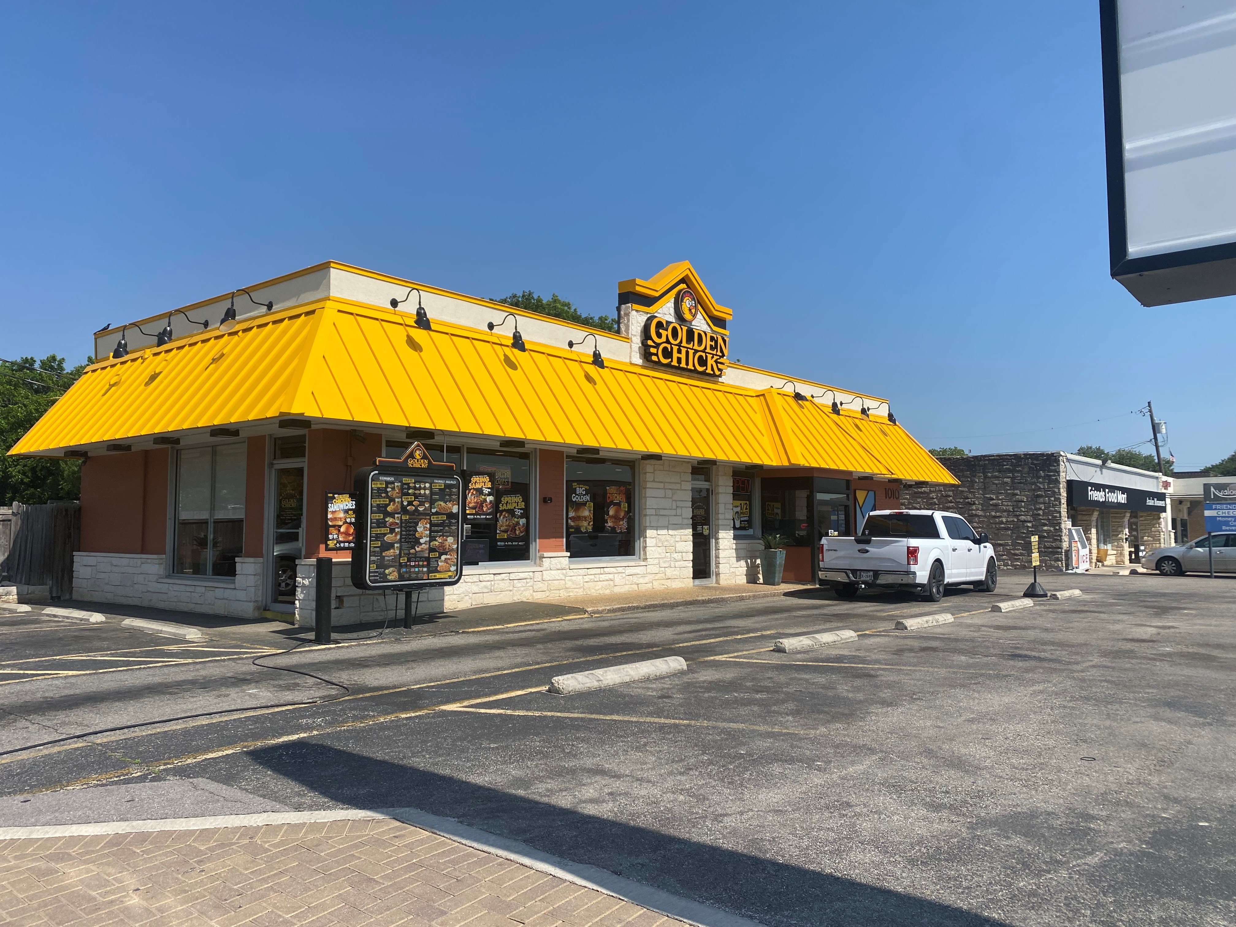 Golden Chick storefront.  Your local Golden Chick fast food restaurant in Georgetown, Texas